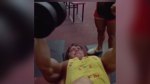 Arnold Schwarzenegger utilizing a flat bench dumbbell flyes exercise in the filming of Pumping Iron